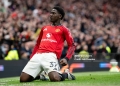 MANCHESTER, ENGLAND - MAY 3:   Kobbie Mainoo of Manchester United celebrates scoring a goal to make the score 3-2 during the Premier League match between Manchester United and Liverpool at Old Trafford on May 3, 2026 in Manchester, United Kingdom. (Photo by Ash Donelon/Manchester United via Getty Images)