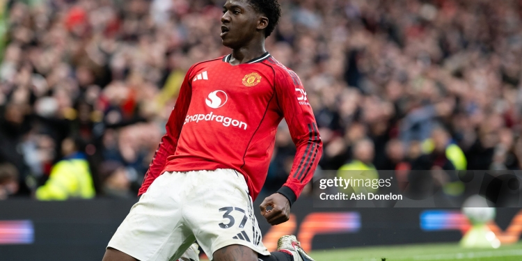 MANCHESTER, ENGLAND - MAY 3:   Kobbie Mainoo of Manchester United celebrates scoring a goal to make the score 3-2 during the Premier League match between Manchester United and Liverpool at Old Trafford on May 3, 2026 in Manchester, United Kingdom. (Photo by Ash Donelon/Manchester United via Getty Images)