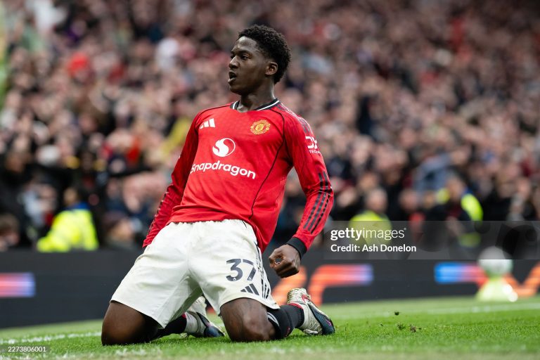 MANCHESTER, ENGLAND - MAY 3:   Kobbie Mainoo of Manchester United celebrates scoring a goal to make the score 3-2 during the Premier League match between Manchester United and Liverpool at Old Trafford on May 3, 2026 in Manchester, United Kingdom. (Photo by Ash Donelon/Manchester United via Getty Images)