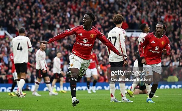 MANCHESTER, ENGLAND - MAY 03: Kobbie Mainoo of Manchester United celebrates scoring his team's third goal during the Premier League match between Manchester United and Liverpool at Old Trafford on May 03, 2026 in Manchester, England. (Photo by Shaun Botterill/Getty Images)