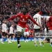 MANCHESTER, ENGLAND - MAY 03: Kobbie Mainoo of Manchester United celebrates scoring his team's third goal during the Premier League match between Manchester United and Liverpool at Old Trafford on May 03, 2026 in Manchester, England. (Photo by Shaun Botterill/Getty Images)