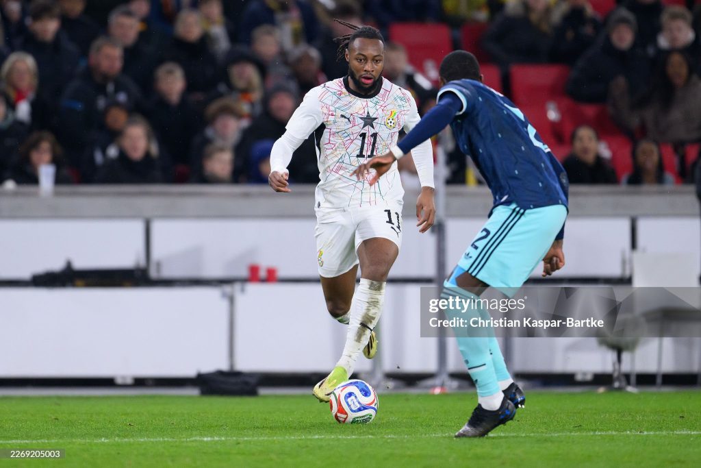 STUTTGART, GERMANY - MARCH 30: Antoine Semenyo of Ghana challenges Antonio Ruediger of Germany during the international friendly match between Germany and Ghana at MHP Arena on March 30, 2026 in Stuttgart, Germany. (Photo by Christian Kaspar-Bartke/Getty Images)