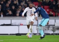 STUTTGART, GERMANY - MARCH 30: Antoine Semenyo of Ghana challenges Antonio Ruediger of Germany during the international friendly match between Germany and Ghana at MHP Arena on March 30, 2026 in Stuttgart, Germany. (Photo by Christian Kaspar-Bartke/Getty Images)