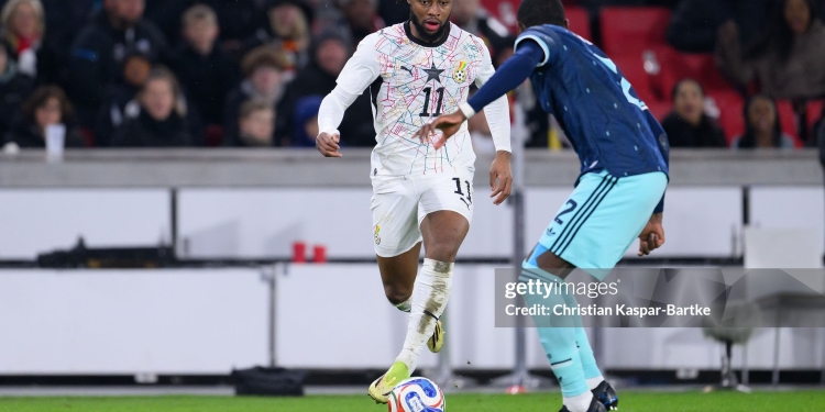 STUTTGART, GERMANY - MARCH 30: Antoine Semenyo of Ghana challenges Antonio Ruediger of Germany during the international friendly match between Germany and Ghana at MHP Arena on March 30, 2026 in Stuttgart, Germany. (Photo by Christian Kaspar-Bartke/Getty Images)