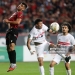 Zakaria Draoui of USM Alger (left) competes for the ball with Mohamed Mohamed Shehata Mahmoud of Zamalek SC during the first leg of the CAF Confederation Cup final between USM Alger and Zamalek SC at the July 5 Stadium in Algiers, Algeria, on May 9, 2025. (Photo by Billel Bensalem/APP/NurPhoto via Getty Images)