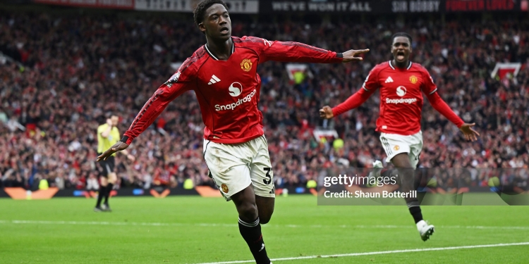 MANCHESTER, ENGLAND - MAY 03: Kobbie Mainoo of Manchester United celebrates scoring his team's third goal during the Premier League match between Manchester United and Liverpool at Old Trafford on May 03, 2026 in Manchester, England. (Photo by Shaun Botterill/Getty Images)