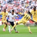 FOXBOROUGH, MASSACHUSETTS - JUNE 23: Jude Bellingham #10 of England is challenged by Gideon Mensah #14 of Ghana during the FIFA World Cup 2026 Group L match between England and Ghana at Boston Stadium on June 23, 2026 in Foxborough, Massachusetts. (Photo by Buda Mendes/Getty Images)