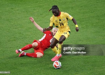 TORONTO, ONTARIO - JUNE 17: Gideon Mensah #14 of Ghana is  tackled by Cristian Martinez #6 of Panama during the FIFA World Cup 2026 Group L match between Ghana and Panama at Toronto Stadium on June 17, 2026 in Toronto, Ontario. (Photo by Dan Mullan/Getty Images)