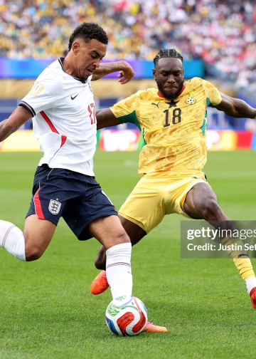 FOXBOROUGH, MASSACHUSETTS - JUNE 23: Morgan Rogers #17 of England controls the ball against Jerome Opoku #18 of Ghana  during the FIFA World Cup 2026 Group L match between England and Ghana at Boston Stadium on June 23, 2026 in Foxborough, Massachusetts. (Photo by Justin Setterfield/Getty Images)