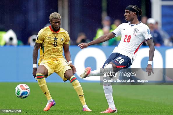 BOSTON, UNITED STATES - JUNE 23: (L-R) Kwasi Sibo of Ghana, Noni Madueke of England during the World Cup match between England v Ghana at the Boston Stadium on June 23, 2026 in Boston United States (Photo by Marcel Bonte/Soccrates/Getty Images)