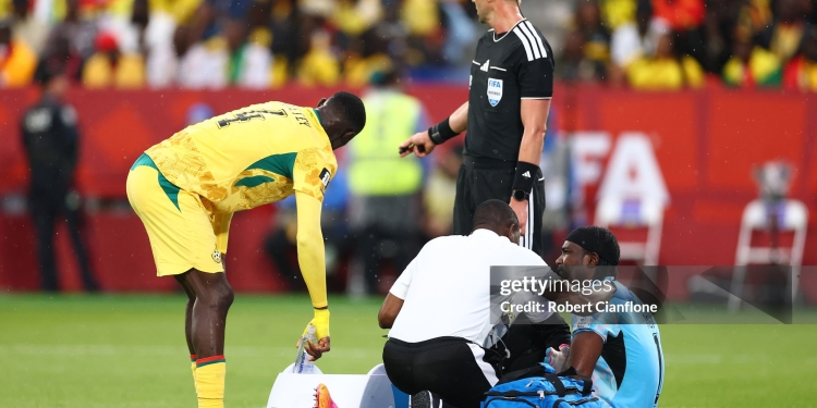 TORONTO, ONTARIO - JUNE 17: Lawrence Ati Zigi #1 of Ghana receives medical attention during the FIFA World Cup 2026 Group L match between Ghana and Panama at Toronto Stadium on June 17, 2026 in Toronto, Ontario. (Photo by Robert Cianflone/Getty Images)