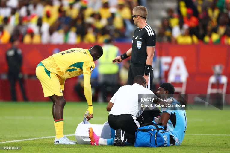 TORONTO, ONTARIO - JUNE 17: Lawrence Ati Zigi #1 of Ghana receives medical attention during the FIFA World Cup 2026 Group L match between Ghana and Panama at Toronto Stadium on June 17, 2026 in Toronto, Ontario. (Photo by Robert Cianflone/Getty Images)