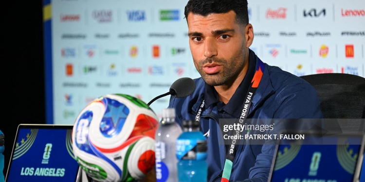Iran's forward #09 Mehdi Taremi gives a press conference at Los Angeles Stadium in Inglewood on June 14, 2026, on the eve of the 2026 World Cup football match between Iran and New Zealand. (Photo by Patrick T. FALLON / AFP via Getty Images)