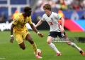 FOXBOROUGH, MASSACHUSETTS - JUNE 23: Anthony Gordon #18 of England takes on Marvin Senaya #26 of Ghana during the FIFA World Cup 2026 Group L match between England and Ghana at Boston Stadium on June 23, 2026 in Foxborough, Massachusetts. (Photo by Richard Pelham/Getty Images)