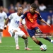 ATLANTA, GEORGIA - JUNE 15: Pau Cubarsi #22 of Spain passes the ball under pressure from Dailon Livramento #19 of Cabo Verde during the FIFA World Cup 2026 Group H match between Spain and Cabo Verde at Atlanta Stadium on June 15, 2026 in Atlanta, Georgia. (Photo by Patrick Smith - FIFA/FIFA via Getty Images)