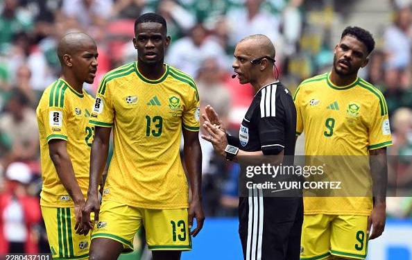 Brazilian referee Wilton Sampaio talks with South Africa's midfielder #13 Sphephelo Sithole during the 2026 World Cup Group A football match between Mexico and South Africa at the Mexico City Stadium in Mexico City on June 11, 2026. (Photo by Yuri CORTEZ / AFP via Getty Images)