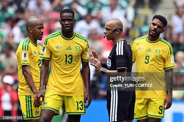 Brazilian referee Wilton Sampaio talks with South Africa's midfielder #13 Sphephelo Sithole during the 2026 World Cup Group A football match between Mexico and South Africa at the Mexico City Stadium in Mexico City on June 11, 2026. (Photo by Yuri CORTEZ / AFP via Getty Images)