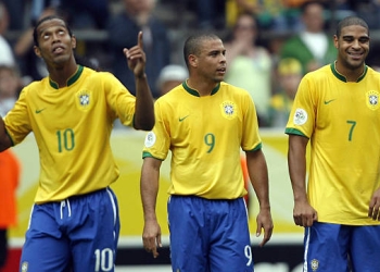 Dortmund, GERMANY:  Brazilian forward Adriano (R) celebrates after scoring his team's second goal with Brazilian forward Ronaldo (C), who scored their first goal, as Brazilian midfielder Ronaldinho (L) gestures during the round of 16 World Cup football match between Brazil and Ghana at Dortmund's World Cup Stadium, 27 June 2006. Brazil were leading 2-0 at half-time.       AFP PHOTO / VANDERLEI ALMEIDA  (Photo credit should read VANDERLEI ALMEIDA/AFP via Getty Images)