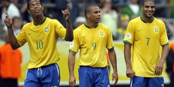 Dortmund, GERMANY:  Brazilian forward Adriano (R) celebrates after scoring his team's second goal with Brazilian forward Ronaldo (C), who scored their first goal, as Brazilian midfielder Ronaldinho (L) gestures during the round of 16 World Cup football match between Brazil and Ghana at Dortmund's World Cup Stadium, 27 June 2006. Brazil were leading 2-0 at half-time.       AFP PHOTO / VANDERLEI ALMEIDA  (Photo credit should read VANDERLEI ALMEIDA/AFP via Getty Images)