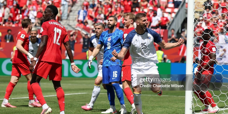 TORONTO, ONTARIO - JUNE 12: Jovo Lukic #25 of Bosnia and Herzegovina celebrates scoring his team's first goal during the FIFA World Cup 2026 Group B match between Canada and Bosnia and Herzegovina at Toronto Stadium on June 12, 2026 in Toronto, Ontario. (Photo by Charlotte Wilson/Getty Images)