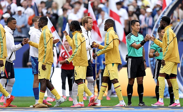 FOXBOROUGH, MASSACHUSETTS - JUNE 23: Harry Kane #9 of England shakes hands with Thomas Partey #5 of Ghana prior to the FIFA World Cup 2026 Group L match between England and Ghana at Boston Stadium on June 23, 2026 in Foxborough, Massachusetts. (Photo by Buda Mendes/Getty Images)