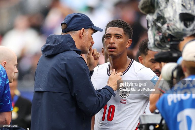 FOXBOROUGH, MASSACHUSETTS - JUNE 23: Thomas Tuchel, Manager of England, speaks to Jude Bellingham #10 of England at the hydration break during the FIFA World Cup 2026 Group L match between England and Ghana at Boston Stadium on June 23, 2026 in Foxborough, Massachusetts. (Photo by Richard Pelham/Getty Images)