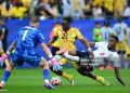 FOXBOROUGH, USA - JUNE 23: Prince Kwabena Adu (25) of Ghana in action against Ezri Konsa (2) of England during the 2026 FIFA World Cup First Stage Group L match between England and Ghana at Gillette Stadium (Boston Stadium) in Foxborough, Massachusetts, United States on June 23, 2026. (Photo by Abdulhamid Hosbas/Anadolu via Getty Images)