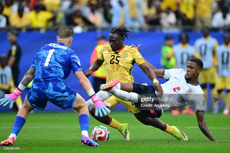 FOXBOROUGH, USA - JUNE 23: Prince Kwabena Adu (25) of Ghana in action against Ezri Konsa (2) of England during the 2026 FIFA World Cup First Stage Group L match between England and Ghana at Gillette Stadium (Boston Stadium) in Foxborough, Massachusetts, United States on June 23, 2026. (Photo by Abdulhamid Hosbas/Anadolu via Getty Images)