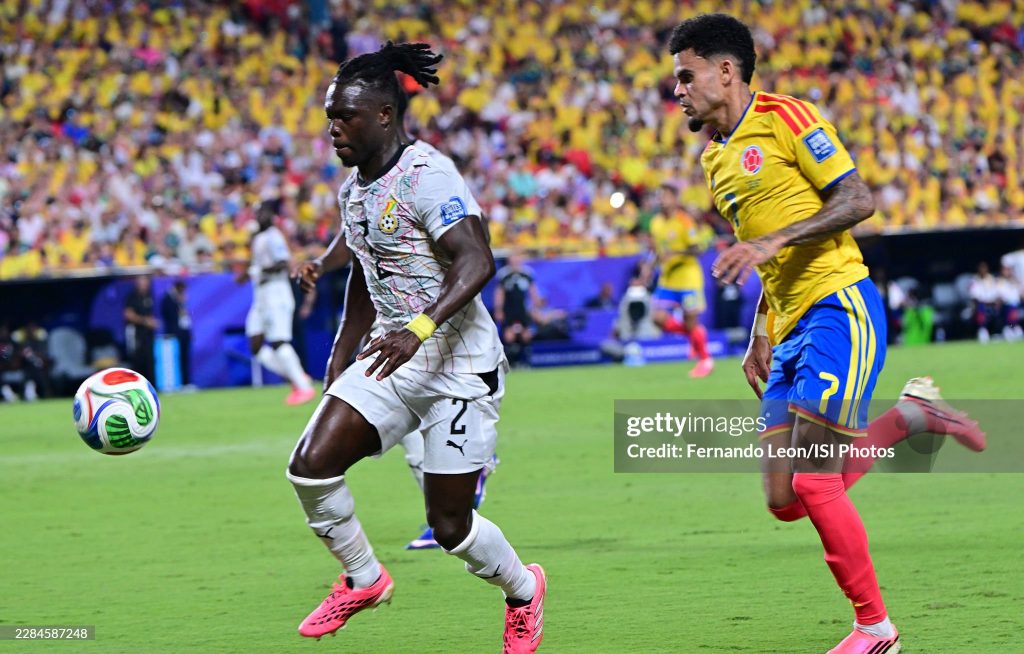 KANSAS CITY, MO - JULY 3:  Alidu Seidu #2 of Ghana dribbles away from Luis Diaz #7 of Colombia during the FIFA World Cup 2026 Round Of 32 match between Colombia and Ghana at Kansas City Stadium on July 3, 2026 in Kansas City, Missouri. (Photo by Fernando Leon/ISI Photos/ISI Photos via Getty Images