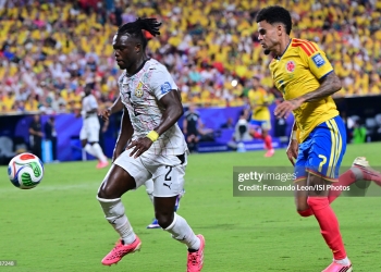 KANSAS CITY, MO - JULY 3:  Alidu Seidu #2 of Ghana dribbles away from Luis Diaz #7 of Colombia during the FIFA World Cup 2026 Round Of 32 match between Colombia and Ghana at Kansas City Stadium on July 3, 2026 in Kansas City, Missouri. (Photo by Fernando Leon/ISI Photos/ISI Photos via Getty Images