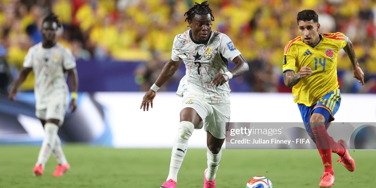 KANSAS CITY, MISSOURI - JULY 03: Fatawu Issahaku #7 of Ghana controls the ball under pressure from Gustavo Puerta #14 of Colombia during the FIFA World Cup 2026 Round of 32 match between Colombia and Ghana at Kansas City Stadium on July 03, 2026 in Kansas City, Missouri. (Photo by Julian Finney - FIFA/FIFA via Getty Images)