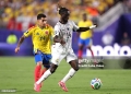KANSAS CITY, MISSOURI - JULY 03: Gideon Mensah #14 of Ghana controls the ball under pressure from Gustavo Puerta #14 of Colombia during the FIFA World Cup 2026 Round of 32 match between Colombia and Ghana at Kansas City Stadium on July 03, 2026 in Kansas City, Missouri. (Photo by Luke Hales/Getty Images)