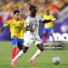 KANSAS CITY, MISSOURI - JULY 03: Gideon Mensah #14 of Ghana controls the ball under pressure from Gustavo Puerta #14 of Colombia during the FIFA World Cup 2026 Round of 32 match between Colombia and Ghana at Kansas City Stadium on July 03, 2026 in Kansas City, Missouri. (Photo by Luke Hales/Getty Images)