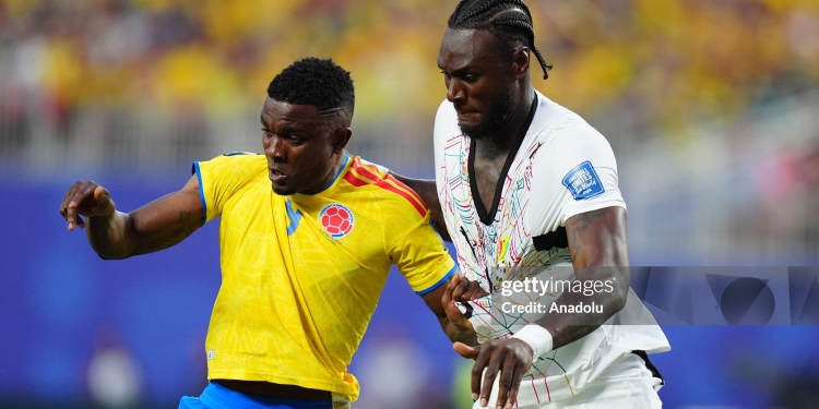 KANSAS CITY, UNITED STATES - JULY 3: Jhon Cordoba (9) of Colombia in action against Jerome Opoku (R) of Ghana during the 2026 FIFA World Cup Round of 32 match between Colombia and Ghana at Arrowhead Stadium (Kansas City Stadium) in Kansas City, Missouri, United States on July 3, 2026. (Photo by Hakan Akgun/Anadolu via Getty Images)