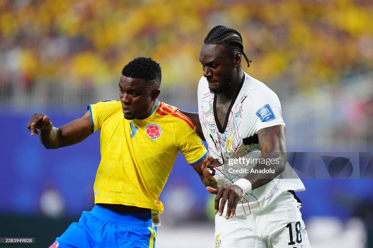 KANSAS CITY, UNITED STATES - JULY 3: Jhon Cordoba (9) of Colombia in action against Jerome Opoku (R) of Ghana during the 2026 FIFA World Cup Round of 32 match between Colombia and Ghana at Arrowhead Stadium (Kansas City Stadium) in Kansas City, Missouri, United States on July 3, 2026. (Photo by Hakan Akgun/Anadolu via Getty Images)