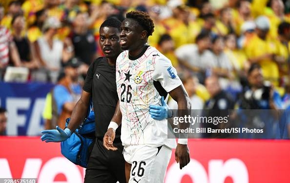 KANSAS CITY, MISSOURI - JULY 03: Marvin Senaya #26 of Ghana leaves the field injured during the first half of a FIFA World Cup 2026 Round Of 32 match between Colombia and Ghana at Kansas City Stadium on July 3, 2026 in Kansas City, Missouri. (Photo by Bill Barrett/ISI Photos/ISI Photos via Getty Images)