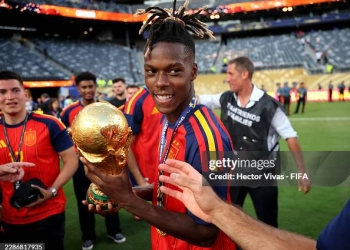 EAST RUTHERFORD, NEW JERSEY - JULY 19: Nico Williams #17 of Spain celebrates with the FIFA World Cup Winner’s Trophy after the team’s victory following the FIFA World Cup 2026 Final match between Spain and Argentina at New York New Jersey Stadium on July 19, 2026 in East Rutherford, New Jersey. (Photo by Hector Vivas - FIFA/FIFA via Getty Images)