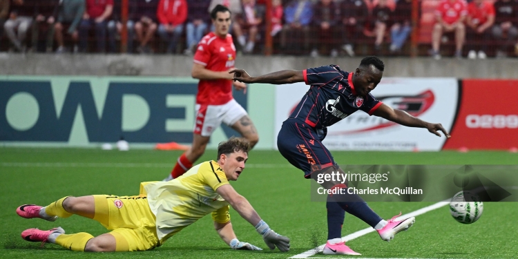 LARNE, NORTHERN IRELAND - JULY 21: Osman Bukari of Red Star Belgrade shoots past Rohan Ferguson of Larne during the UEFA Champions League 2026/27 second qualifying round first leg match between Larne and Red Star Belgrade at Inver Park on July 21, 2026 in Larne, Northern Ireland. (Photo by Charles McQuillan/Getty Images)