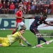 LARNE, NORTHERN IRELAND - JULY 21: Osman Bukari of Red Star Belgrade shoots past Rohan Ferguson of Larne during the UEFA Champions League 2026/27 second qualifying round first leg match between Larne and Red Star Belgrade at Inver Park on July 21, 2026 in Larne, Northern Ireland. (Photo by Charles McQuillan/Getty Images)