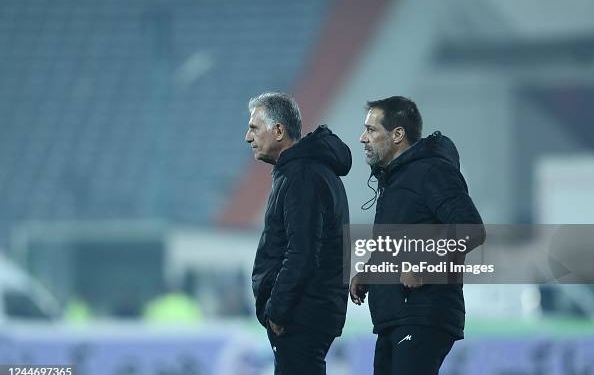 TEHRAN, IRAN - NOVEMBER 10: head coach Carlos Queiroz of Iran and head coach Roger De Sa of Iran look on during the Friendly match between Iran v Nicaragua on November 10, 2022 in Tehran, Iran. (Photo by Mohammad Karamali/DeFodi Images via Getty Images)