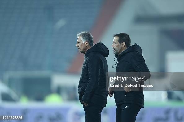 TEHRAN, IRAN - NOVEMBER 10: head coach Carlos Queiroz of Iran and head coach Roger De Sa of Iran look on during the Friendly match between Iran v Nicaragua on November 10, 2022 in Tehran, Iran. (Photo by Mohammad Karamali/DeFodi Images via Getty Images)