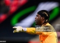 19 December 2024, Baden-Württemberg, Heidenheim: Soccer: UEFA Europa Conference League, 1. FC Heidenheim - FC St. Gallen, preliminary round, matchday 6, Voith-Arena. St. Gallen goalkeeper Lawrence Ati-Zigi gesticulates. Photo: Tom Weller/dpa (Photo by Tom Weller/picture alliance via Getty Images)