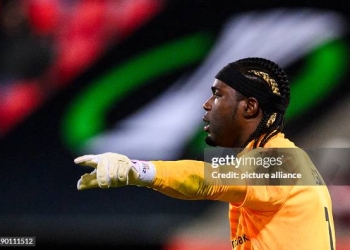 19 December 2024, Baden-Württemberg, Heidenheim: Soccer: UEFA Europa Conference League, 1. FC Heidenheim - FC St. Gallen, preliminary round, matchday 6, Voith-Arena. St. Gallen goalkeeper Lawrence Ati-Zigi gesticulates. Photo: Tom Weller/dpa (Photo by Tom Weller/picture alliance via Getty Images)