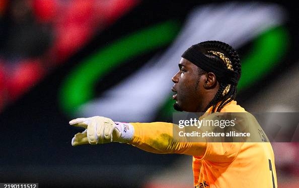19 December 2024, Baden-Württemberg, Heidenheim: Soccer: UEFA Europa Conference League, 1. FC Heidenheim - FC St. Gallen, preliminary round, matchday 6, Voith-Arena. St. Gallen goalkeeper Lawrence Ati-Zigi gesticulates. Photo: Tom Weller/dpa (Photo by Tom Weller/picture alliance via Getty Images)