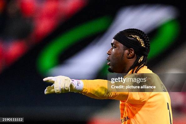 19 December 2024, Baden-Württemberg, Heidenheim: Soccer: UEFA Europa Conference League, 1. FC Heidenheim - FC St. Gallen, preliminary round, matchday 6, Voith-Arena. St. Gallen goalkeeper Lawrence Ati-Zigi gesticulates. Photo: Tom Weller/dpa (Photo by Tom Weller/picture alliance via Getty Images)