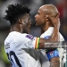 TOPSHOT - Ghana's midfielder #10 Andre Ayew (L) celebrates with Ghana's midfielder #20 Mohammed Kudus after scoring his team's first goal during the Qatar 2022 World Cup Group H football match between Portugal and Ghana at Stadium 974 in Doha on November 24, 2022. (Photo by MANAN VATSYAYANA / AFP via Getty Images)