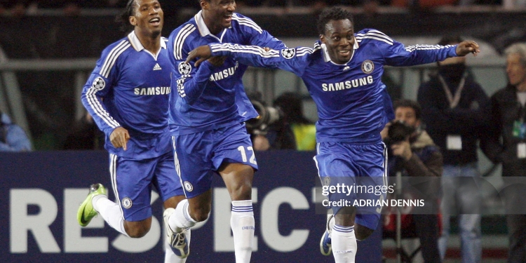 Chelsea's Ivorian forward Didier Drogba (L) and team mate John Obi Mikel (C) celebrate with Ghanian midfielder Michael Essien after he scored against Juventus during their Champions League second leg first knockout round football match on March 10, 2009 at Olympic Stadium in Turin.      AFP PHOTO / ADRIAN DENNIS (Photo by ADRIAN DENNIS / AFP via Getty Images)
