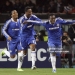 Chelsea's Ivorian forward Didier Drogba (L) and team mate John Obi Mikel (C) celebrate with Ghanian midfielder Michael Essien after he scored against Juventus during their Champions League second leg first knockout round football match on March 10, 2009 at Olympic Stadium in Turin.      AFP PHOTO / ADRIAN DENNIS (Photo by ADRIAN DENNIS / AFP via Getty Images)