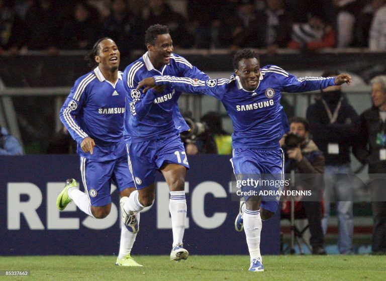 Chelsea's Ivorian forward Didier Drogba (L) and team mate John Obi Mikel (C) celebrate with Ghanian midfielder Michael Essien after he scored against Juventus during their Champions League second leg first knockout round football match on March 10, 2009 at Olympic Stadium in Turin. AFP PHOTO / ADRIAN DENNIS (Photo by ADRIAN DENNIS / AFP via Getty Images)