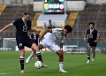 21 August 2026, North Rhine-Westphalia, Krefeld: Soccer, Men: DFB Cup, SC St. Tönis 11/20 vs. Eintracht Frankfurt, First Round, Grotenburg Stadium; Bilal Brusdeilins (left, Tönis) and Malik Pimpong (Eintracht Frankfurt) battle for the ball. Photo: Federico Gambarini/dpa - IMPORTANT NOTICE: In accordance with the regulations of the Bundesliga and the DFB (German Football Association), it is prohibited to use or allow the use of photographs taken in the stadium and/or during the game in the form of sequential images and/or video-like photo series. (Photo by Federico Gambarini/picture alliance via Getty Images)